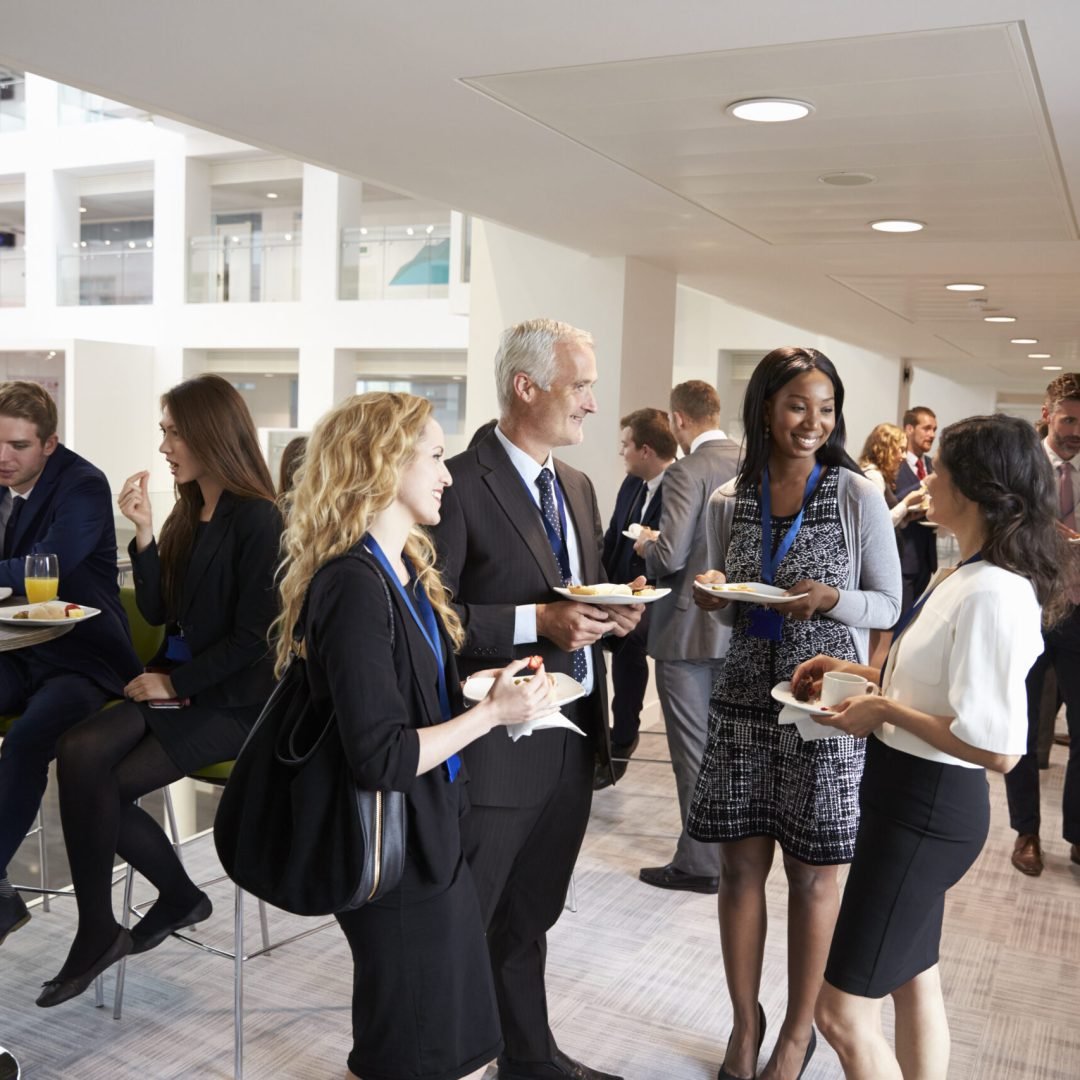 Delegates Networking During Conference Lunch Break